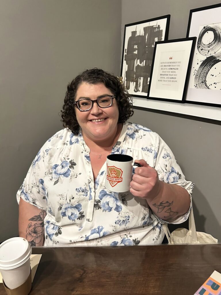 Katie Dehn with the Ramshackle United mug.